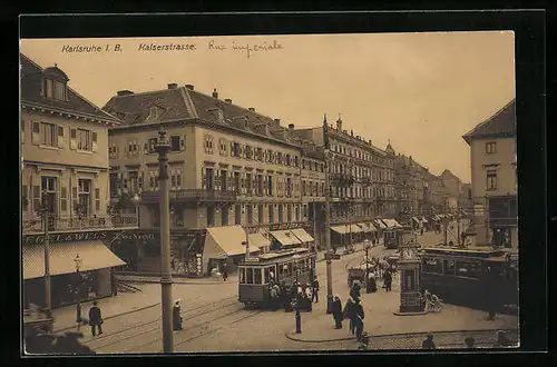 AK Karlsruhe i. B., Kaiserstrasse mit Geschäften und Strassenbahn