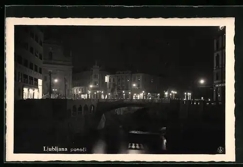 AK Ljubljana / Laibach, Ponoci, Stadt bei Nacht mit Beleuchtung