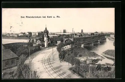 AK Kehl a. Rh., Die Rheinbrücken mit Kähnen und Fabrikschornsteinen im Hintergrund