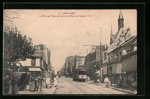 AK Les Lilas, La Rue de Paris avec au coin de la Rue de l`Avenir, Strassenbahn