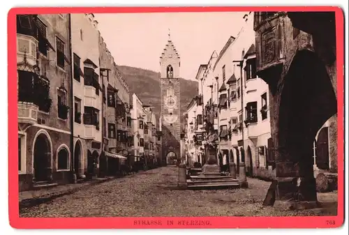 Fotografie Würthle & Spinnhirn, Salzburg, Schwarzstr., Ansicht Sterzing, Blick in einer Strasse mit Zwölferturm