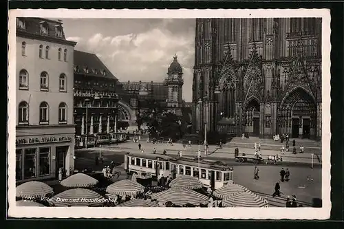 AK Köln, Strassenbahn fährt am Domplatz vorbei