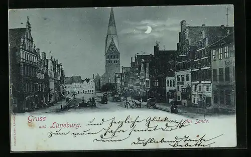 Mondschein-AK Lüneburg, Strasse Am Sande mit Geschäften und Brunnen