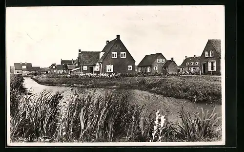 AK Petten, Uferpartie mit Blick zur Wohnsiedlung