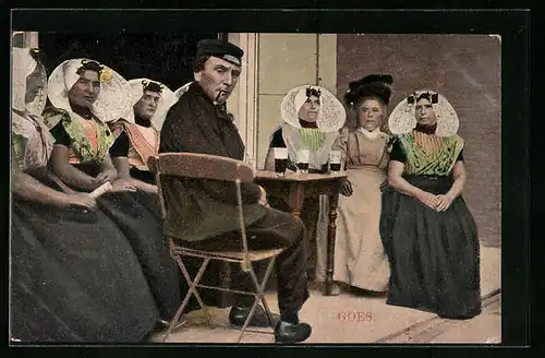 AK Goes, Mann mit Frauen in Tracht am Tisch