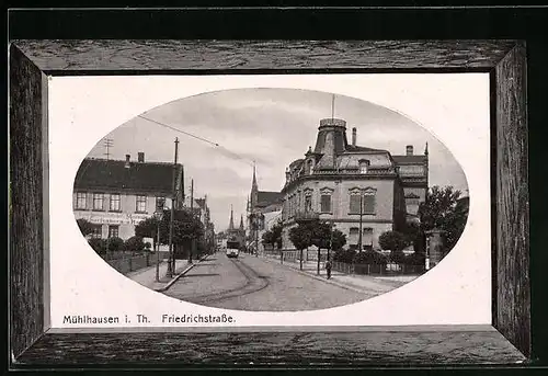 AK Mühlhausen / Thür., Friedrichstrasse mit anfahrander Strassenbahn