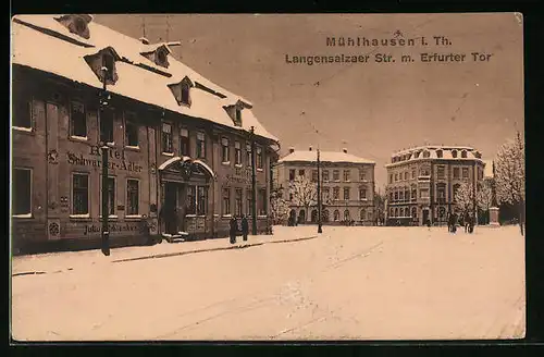 AK Mühlhausen / Thür., Langensalzaer Strasse mit Hotel schwarzer Adler und Erfurter Tor im Winter