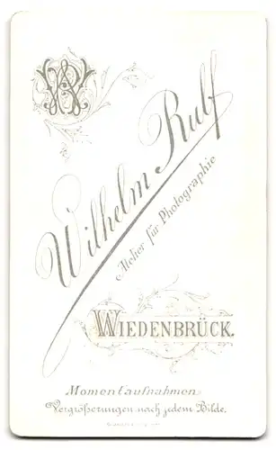 Fotografie Wilhelm Rulf, Wiedenbrück, Portrait junger charmanter Mann mit Krawatte im Jackett