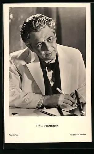 AK Schauspieler Paul Hörbiger charmant am Tisch schreibend