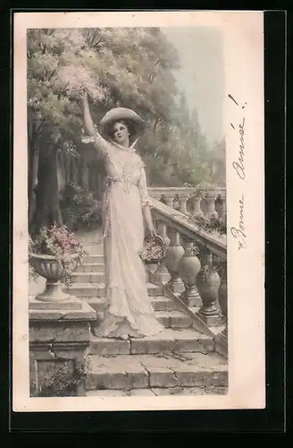 Künstler-AK M. Munk Nr. 275: Junge Frau pflückt Blüten vom Baum