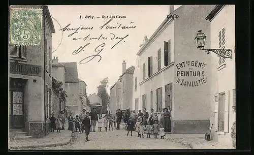 AK Olrly, Rue des Caves, Strassenpartie