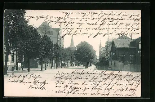 AK Uelzen, Bahnhofstrasse mit Kirchturm