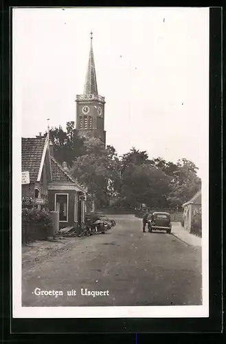 AK Usquert, Strassenpartie mit Kirche