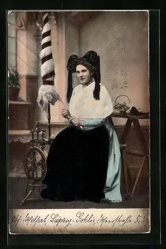 Präge-AK Junge Frau am Spinnrad in elsass-lothringischer Tracht