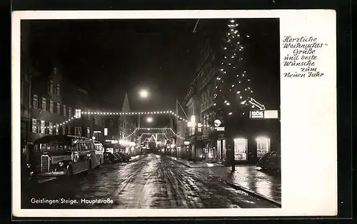 AK Geislingen /Steige, Hauptstrasse mit Geschäften bei Nacht, Weihnachts- u. Neujahrsgruss