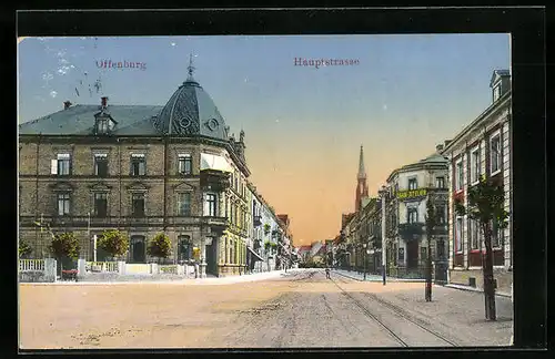 AK Offenburg, Hauptstrasse mit Zahn-Atelier, Geschäften u. Kirche
