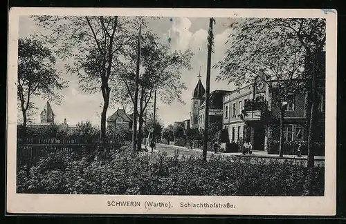 AK Schwerin /Warthe, Schlachthofstrasse mit Geschäft