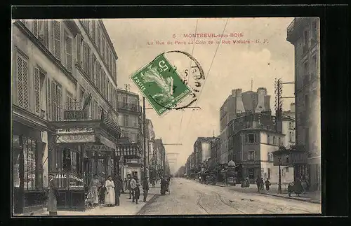 AK Montreuil-sous-Bois, La Rue de Paris au Coin de la Rue Voltaire