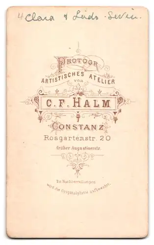 Fotografie C.F. Halm, Konstanz, Rosgartenstr. 20, Mädchen und Kleinkind im Foto-Atelier