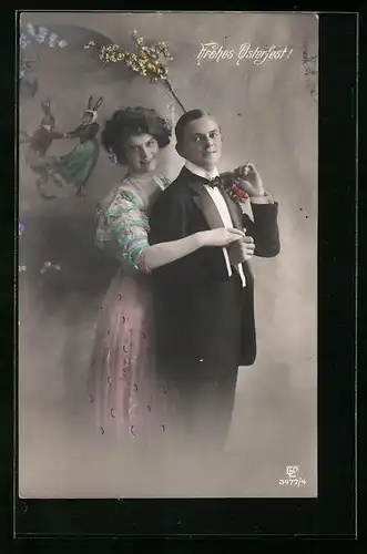 Foto-AK GL Co: Liebespaar mit Zweig, Ostergruss
