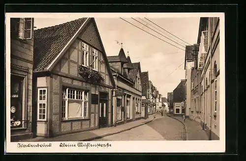 AK Quakenbrück, Kleine Mühlenstrasse mit Geschäften