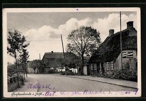 AK Grossenbrode i. Holst., Reetgedeckte Häuser, Emaille-Reklameschild Lübecker General-Anzeiger