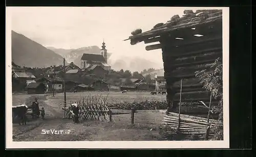 AK St. Veit /Pongau, Dorfpartie mit Kirche