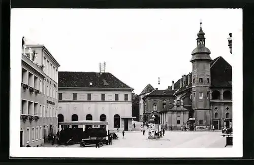Foto-AK Marburg /Drau, Strassenpartie mit Litfasssäule