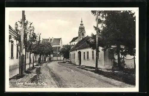 AK Unter-Retzbach, Strassenpartie mit Blick zur Kirche