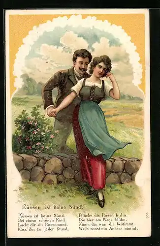 Präge-AK Küssen ist keine Sünd', Liebespaar an einer Mauer stehend