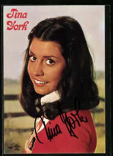 AK Musikerin Tina York blickt lächelnd über die Schulter, Autograph