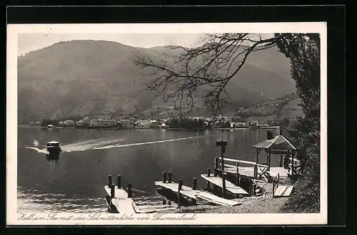 AK Zell am See, See mit Bootsstegen vor Schmittenhöhe