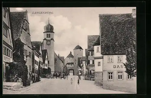 AK Langenburg, Strasse Innere Stadt mit Uhrenturm und Metzgerei