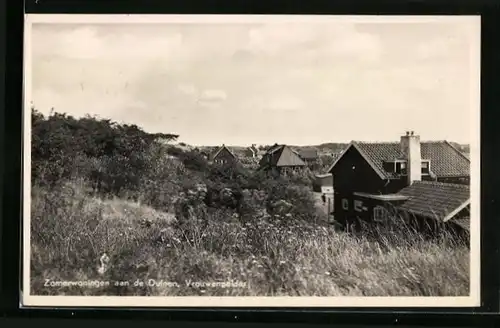 AK Vrouwenpolder, kleine Häuschen an den Dünen