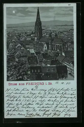 Mondschein-AK Freiburg i. Br., Blick zur Kirche