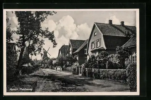 AK Aurich, Strassenpartie vom Thedaweg mit Windmühle