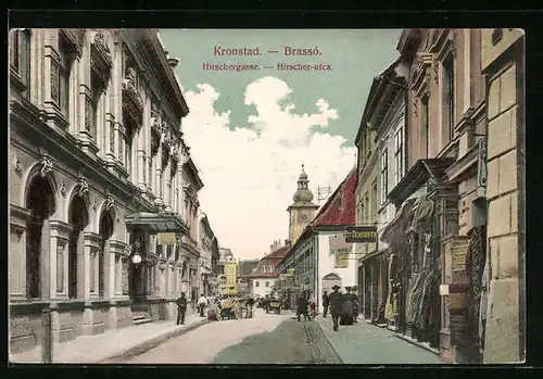 AK Kronstadt, Hirschergasse mit Geschäften und Kirchturm