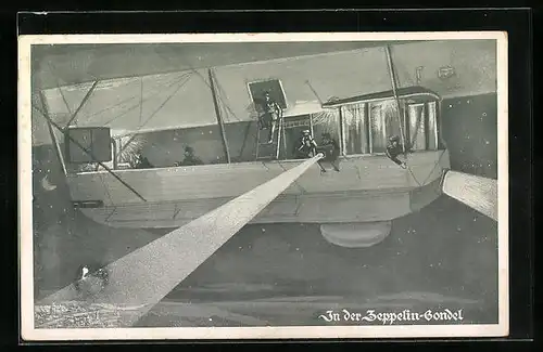 AK In der Zeppelin-Gondel über der Stadt bei Nacht