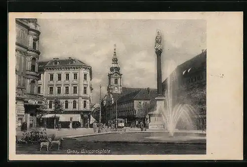 AK Graz, Bismarckplatz mit Springbrunnen und zwei Hunden