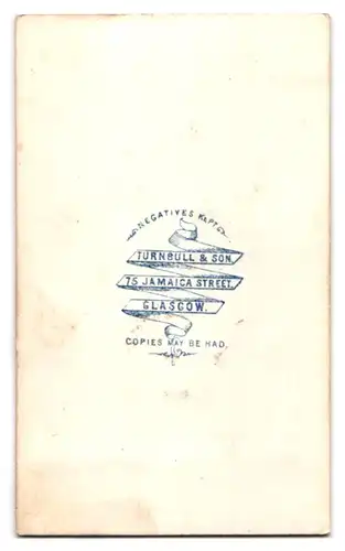 Fotografie Turnbull & Son, Glasgow, 75. Jamaica Street, Schnöseliger Bursche mit gewichstem Scheitel im teuren Anzug