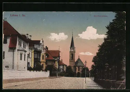 AK Löbau i. Sa., Goethestrasse mit Kirche