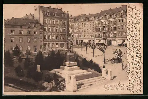 AK Löbau i. S., Bismarck Denkmal mit Strassenpartie