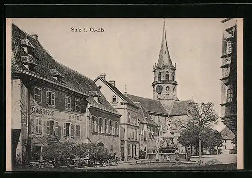 AK Sulz /O.-Els., Ortspartie mit Gasthof Hotel und Brunnen