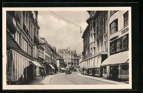 AK Mülhausen, Wildemann-Strasse mit Strassenbahn