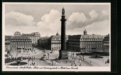 AK Darmstadt, Strassenbahn am Platz mit Ludwigsäule und Hotel zur Traube