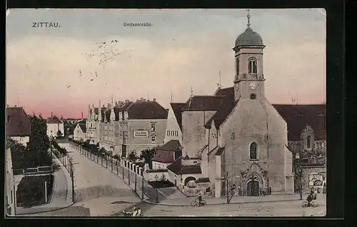 AK Zittau, Sedanstrasse mit Kirche
