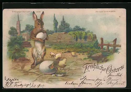 AK Osterhase und Osterküken, Halt gegen das Licht: Engel mit Glocke am Himmel