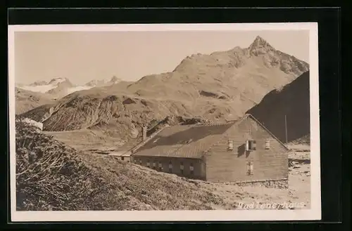 AK Berghütte Madlenerhaus vor einem Gebirgspanorama