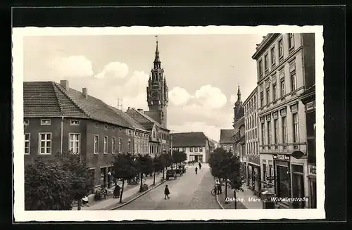 AK Dahme /Mark, Wilhelmstrasse mit Friseurgeschäft und Kirche