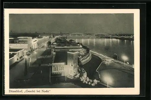 AK Düsseldorf, Grosse Ausstellung Gesolei bei Nacht, 1926, Blick über die beleuchtete Stadt mit Brücke